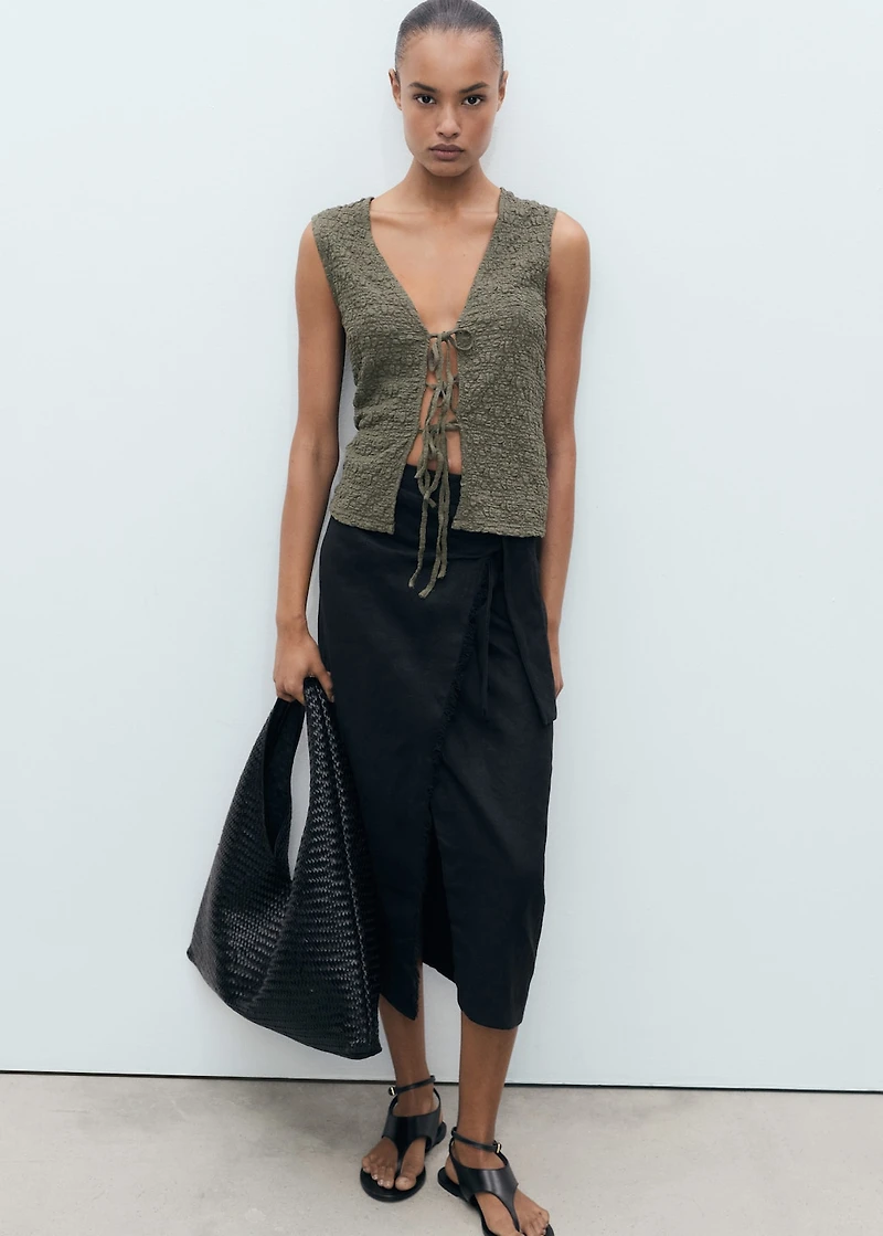 Textured top with bow