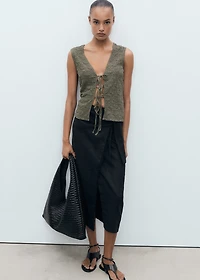 Textured top with bow