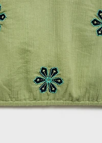 Asymmetrical embroidered top