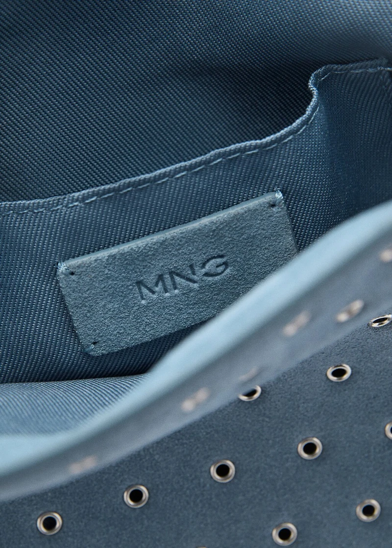 Die-cut leather shoulder bag