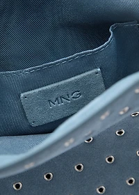 Die-cut leather shoulder bag