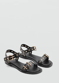 Strap sandals with buckles and eyelet details