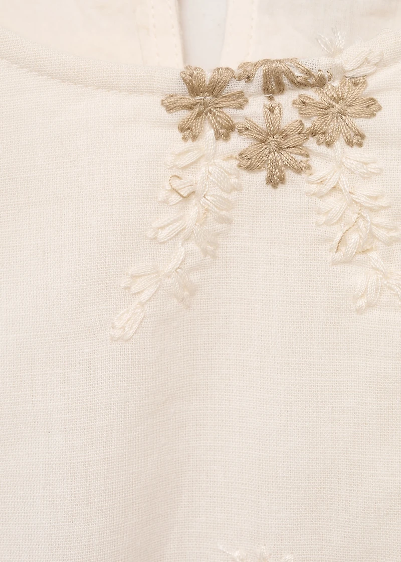 Short dress with embroidered detail