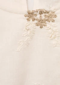 Short dress with embroidered detail