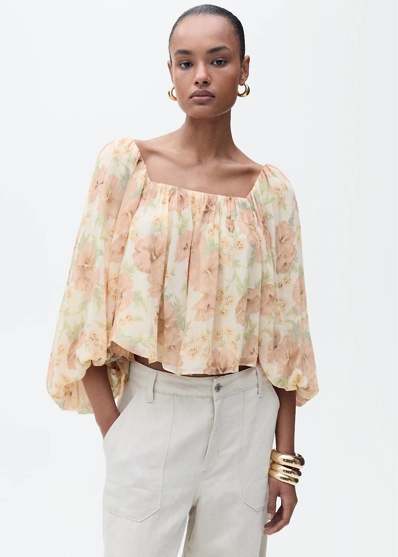 Open-back floral blouse