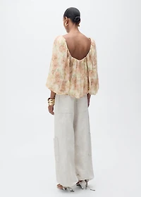 Open-back floral blouse