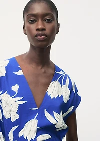 Printed long jumpsuit with belt