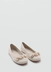 Ballet flats with flower embellishment