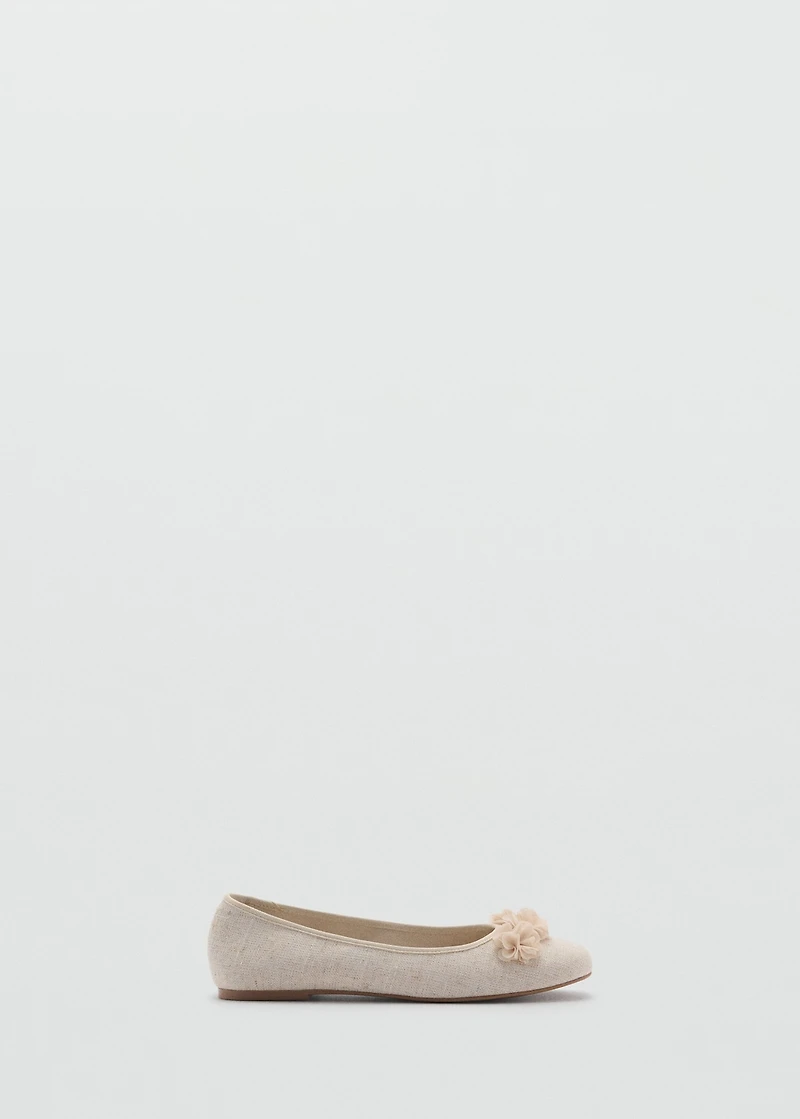 Ballet flats with flower embellishment