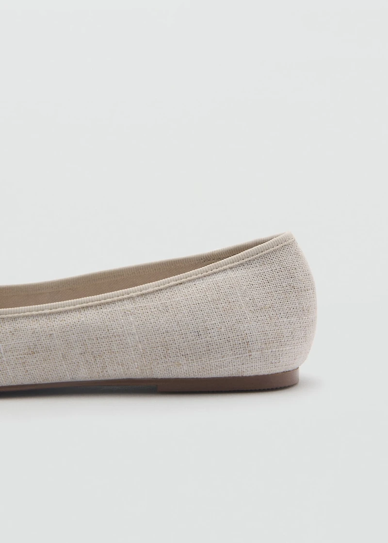 Ballet flats with flower embellishment