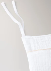 Cot organizer with piping