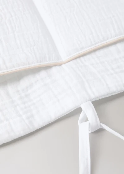 Cot organizer with piping