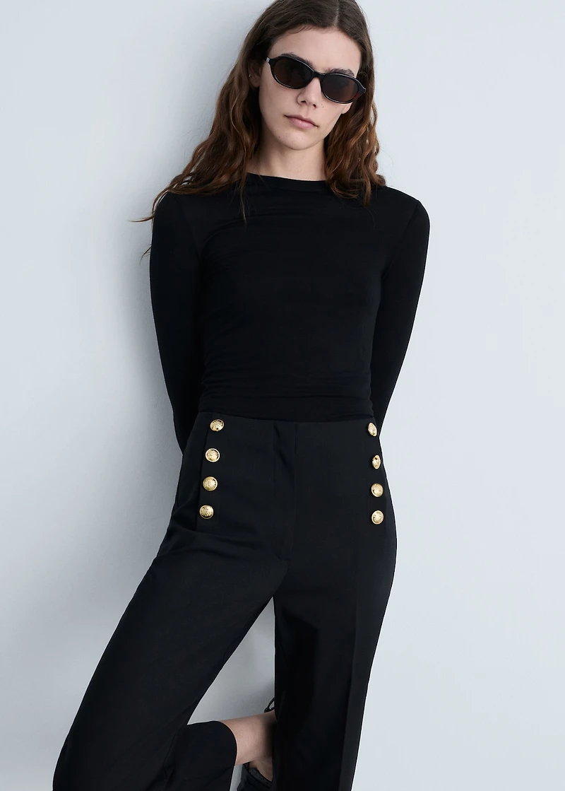 Straight pants with jewel buttons