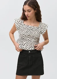 Denim mini-skirt with pockets