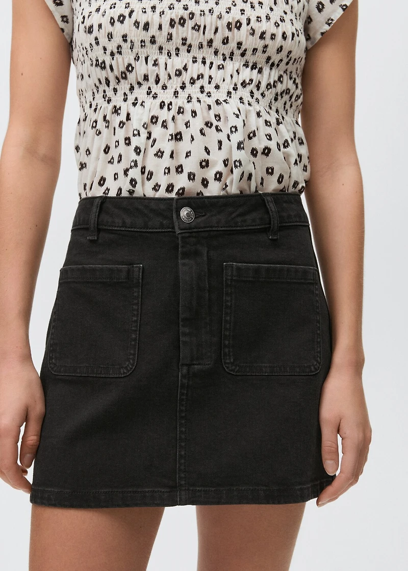 Denim mini-skirt with pockets