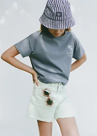 Denim shorts with frayed hem