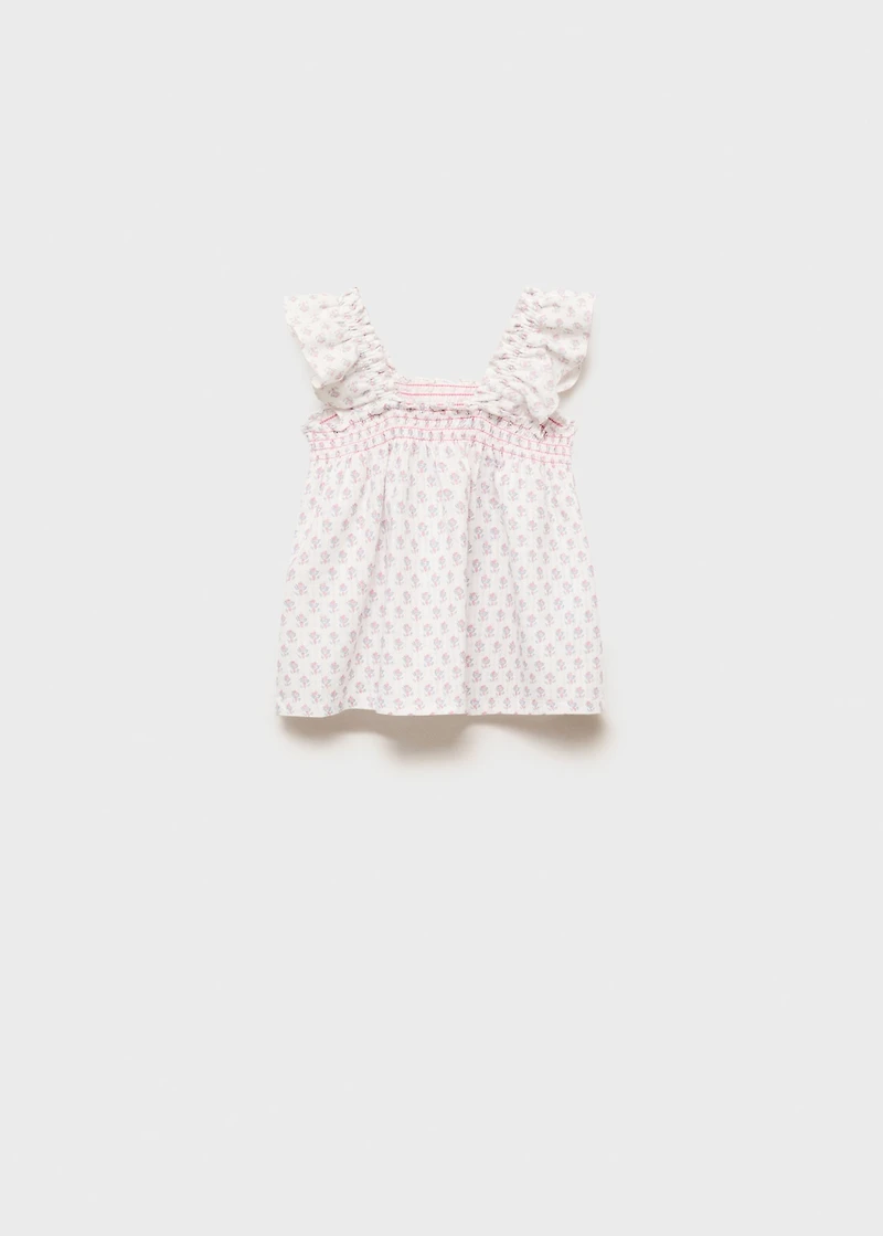 Ruffled embroidered blouse