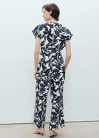 Printed linen jumpsuit with belt