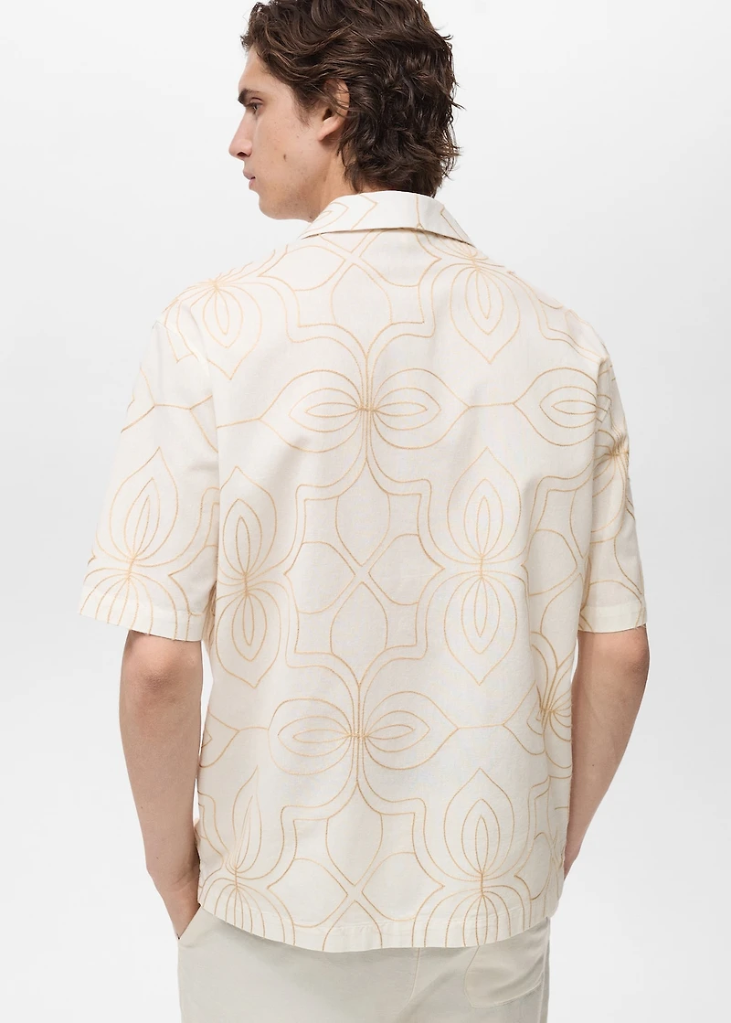 Shirt with embroidered bowling collar