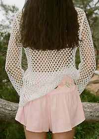 Crochet cardigan with bow closure