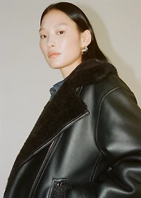 Jacket with faux shearling lining