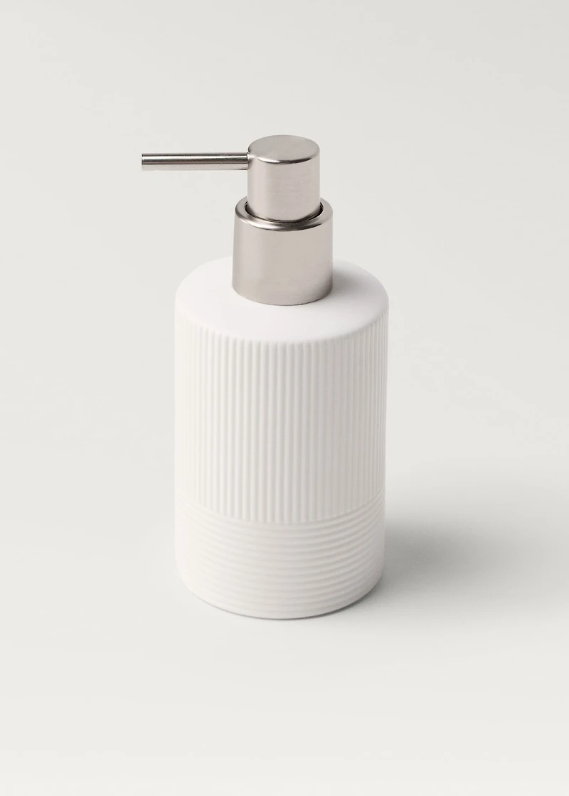 Stoneware soap dispenser with relief