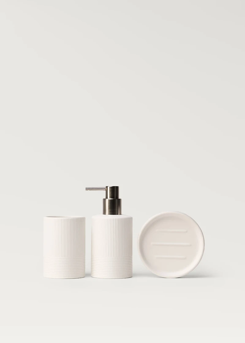 Stoneware soap dispenser with relief