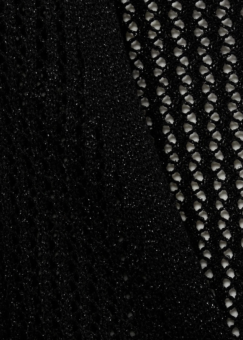 Knitted vest with lace pattern