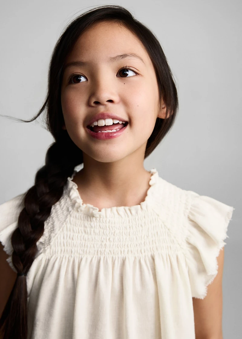 Linen-blend ruffled blouse