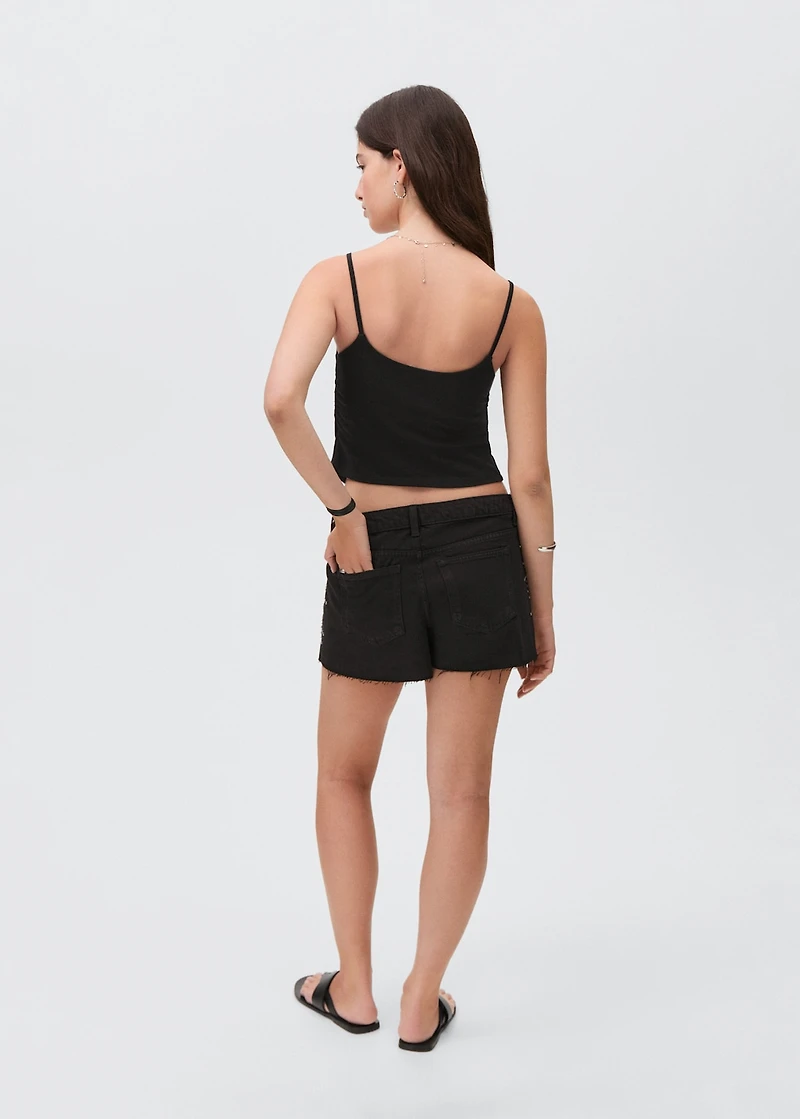 Studded denim shorts