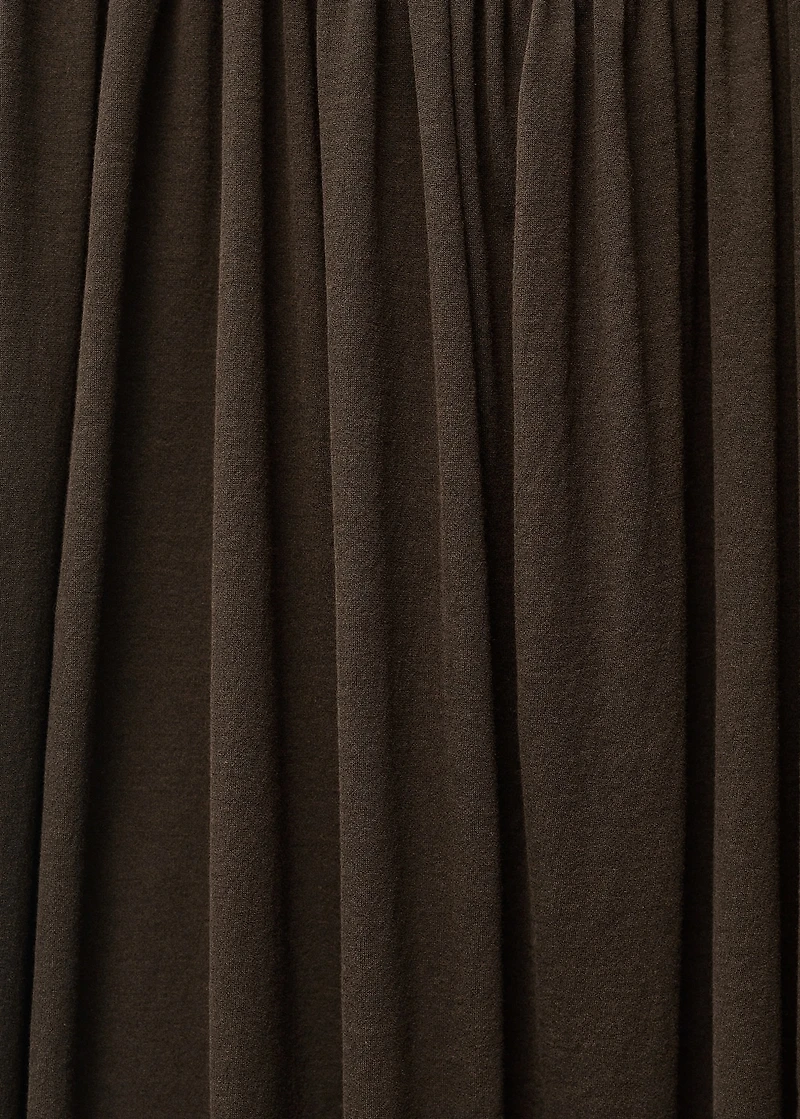 Semi-transparent dress with puffed hem