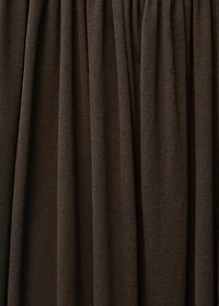 Semi-transparent dress with puffed hem