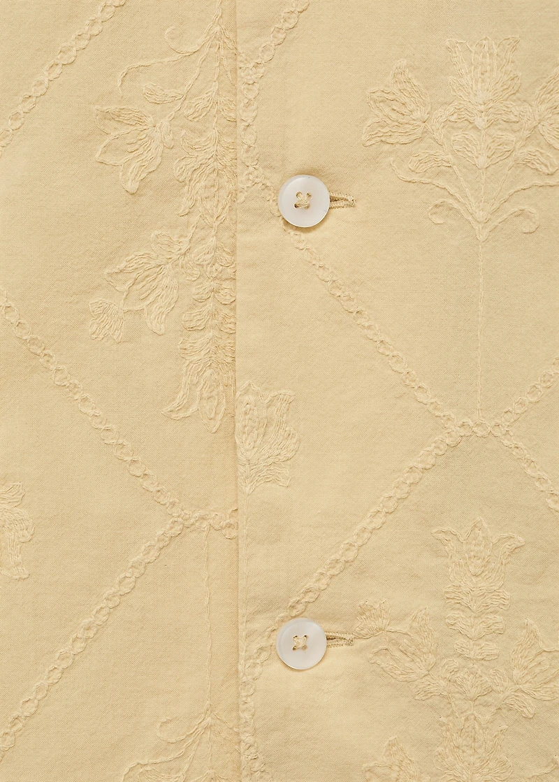 Shirt with embroidered bowling collar