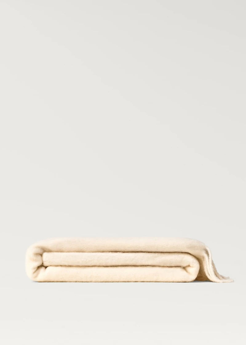 Soft-effect blanket with fringed trim