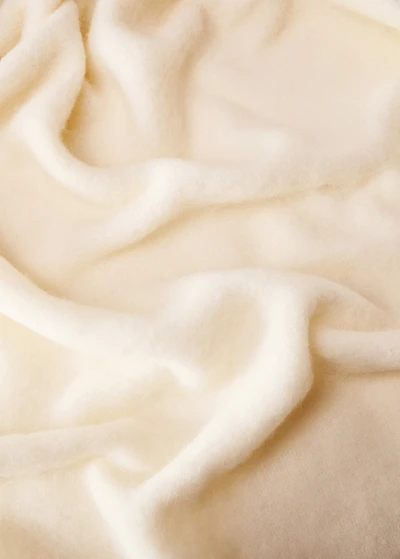 Soft-effect blanket with fringed trim