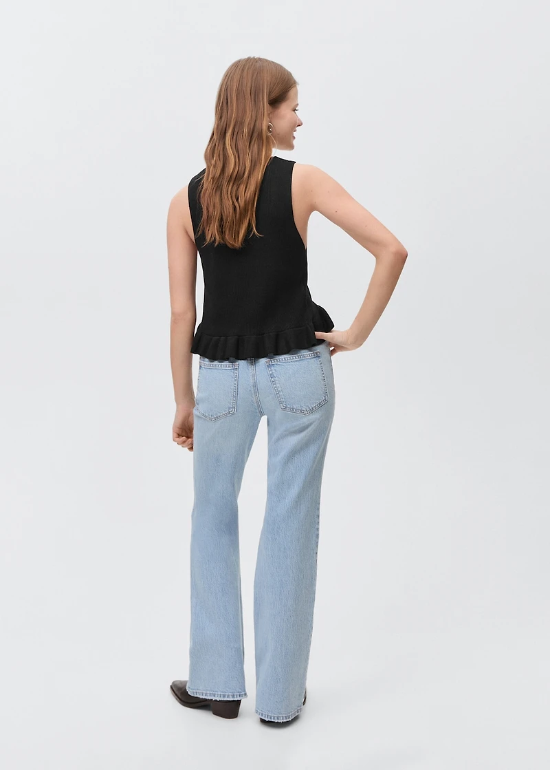 Flared jeans with decorative rips