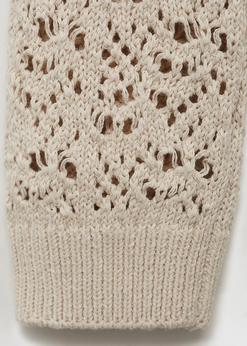 Knitted sweater with hood and lace pattern