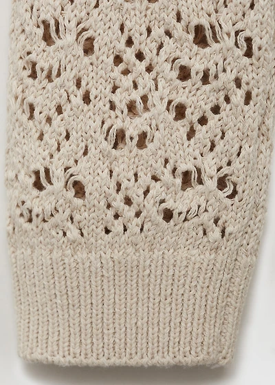 Knitted sweater with hood and lace pattern