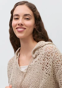 Knitted sweater with hood and lace pattern