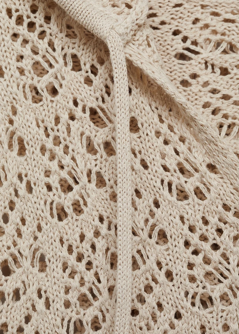 Knitted sweater with hood and lace pattern