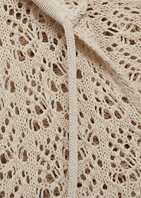 Knitted sweater with hood and lace pattern