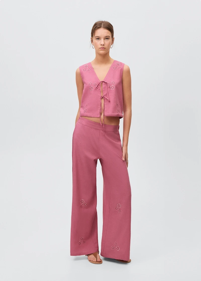 Embroidered vest with bows