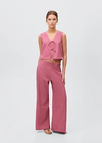 Embroidered vest with bows