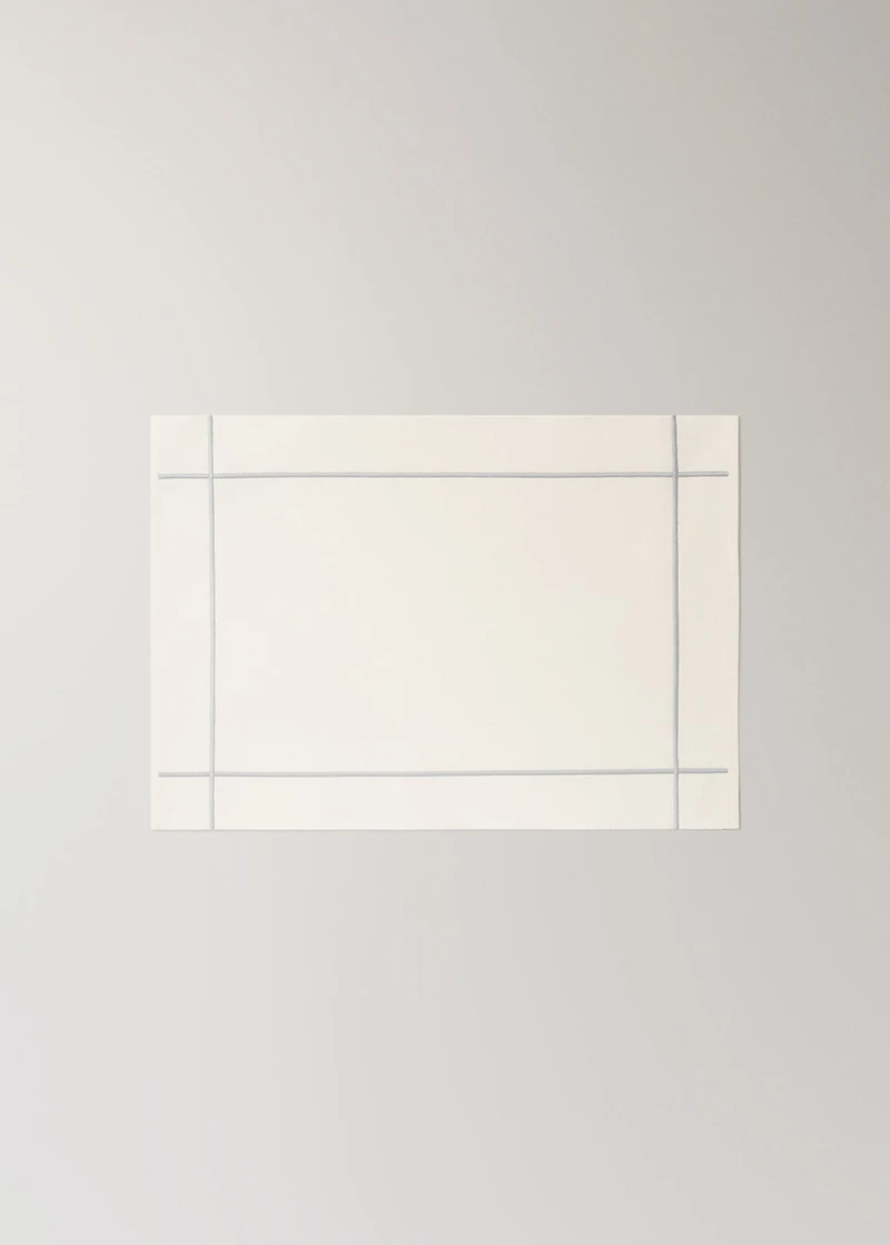 Cotton embroidered placemat with scalloped detail