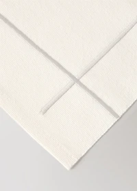 Cotton embroidered placemat with scalloped detail