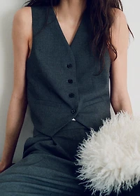 Vest with adjustable belt