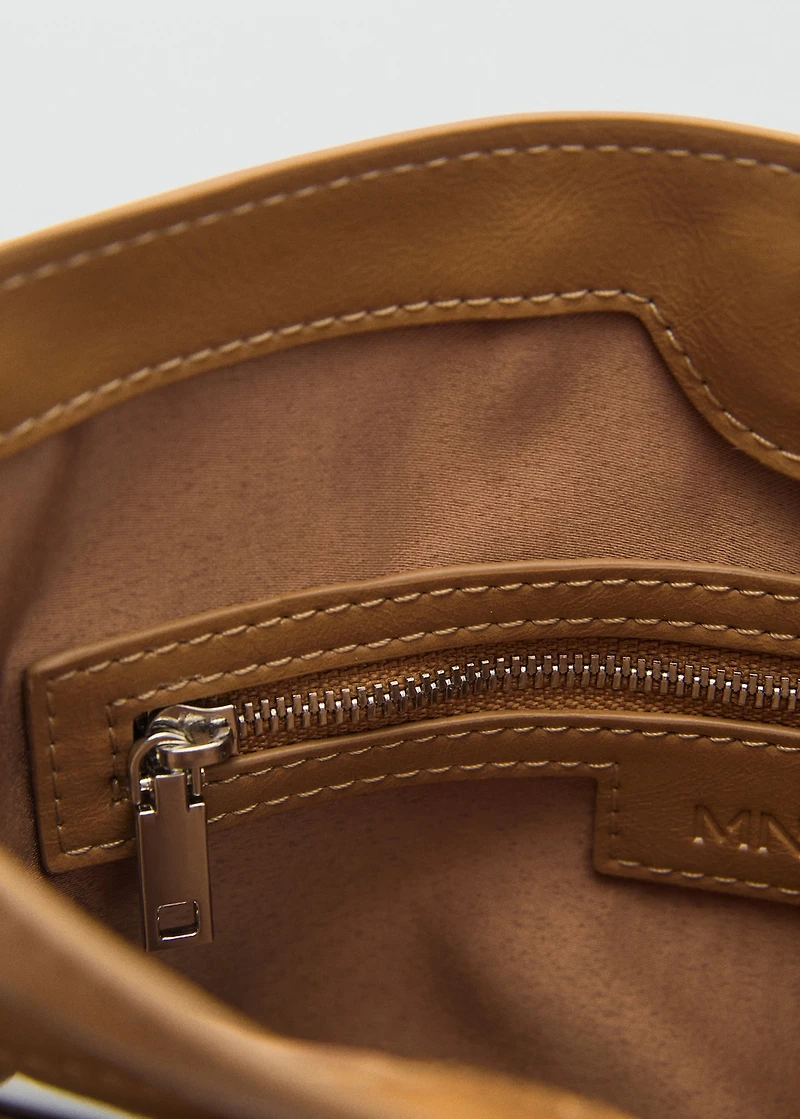 Shoulder bag with pochette pocket