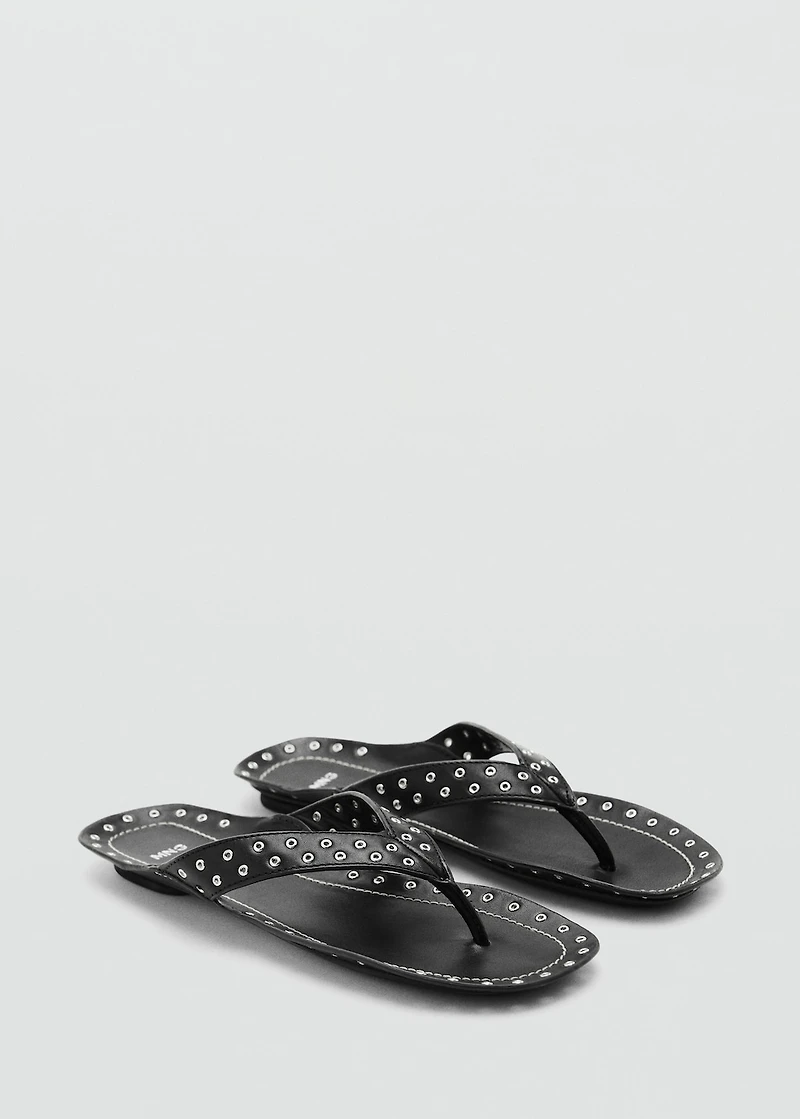 Leather sandals with eyelets