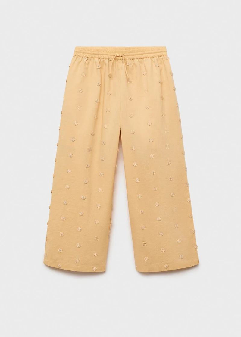 Long pants with embroidered details