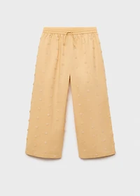 Long pants with embroidered details